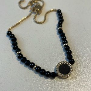 Bundle and save! Black and gold bracelet. Adjustable gold chain. 🌞